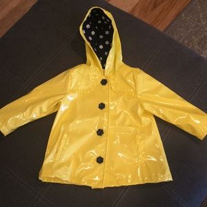 baby in raincoat